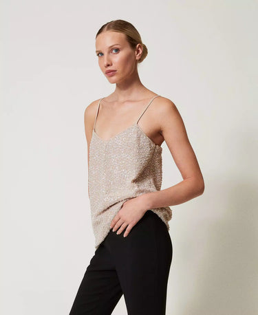 Top with sequins and pearls